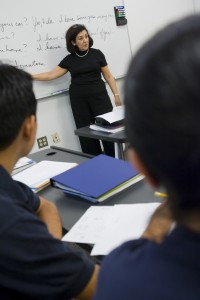 Photo of a teacher instructing students at the Stamford Campus.